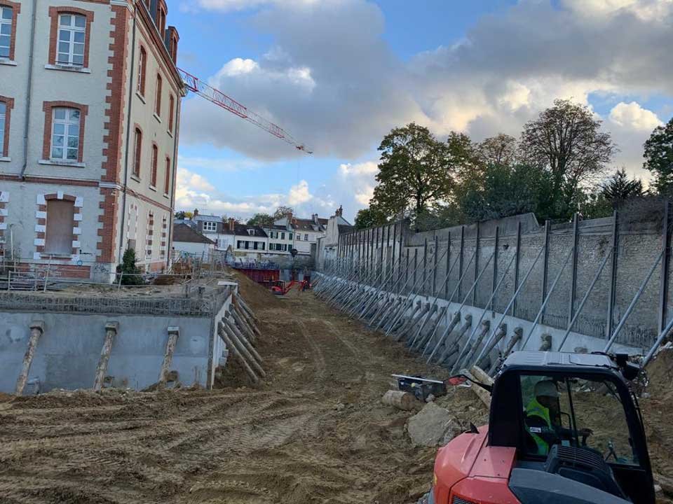 Béton projeté — voile par passes